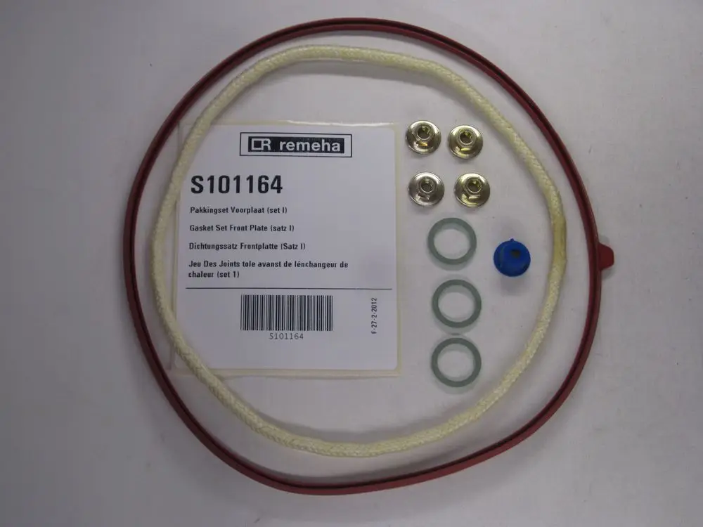Dichtungssatz von Remeha mit verschiedenen Dichtungen, Unterlegscheiben und einer Gasket-Dichtung in einer Verpackung, auf einem hellen Hintergrund.